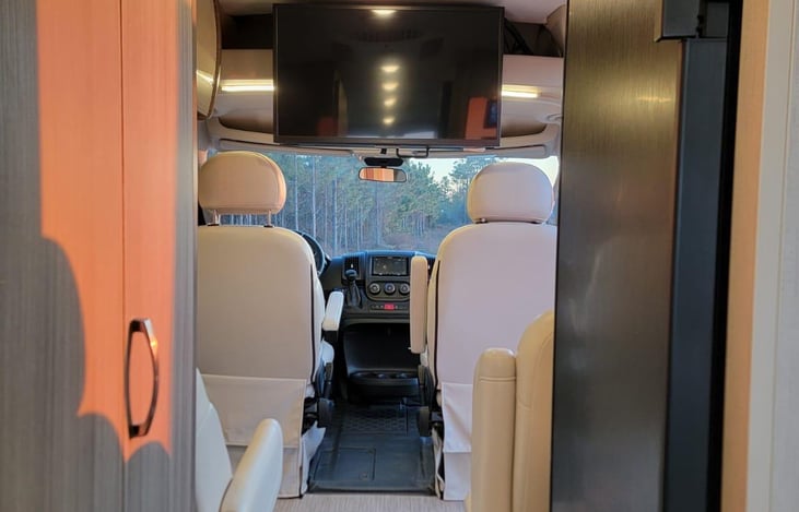 Proper lighting can truly enhance the ambiance of an RV, creating a cozy and inviting atmosphere.  Enjoying movies and shows on a 32" TV after a day of exploring adds to the overall travel experience.