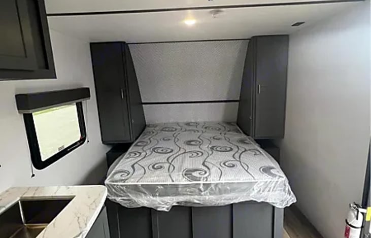 A hidden queen-size Murphy bed is a game-changer for optimizing space!