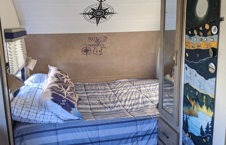 Queen short bed, closet, and drawers. Bed has foam topper.