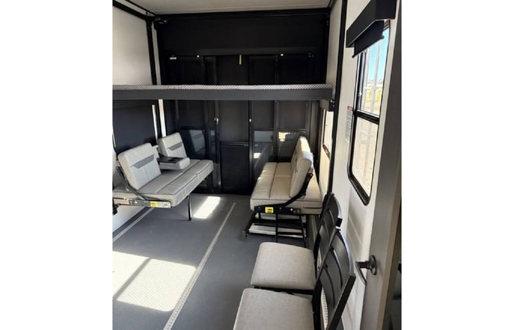 Garage with couches set up. Can turn into a queen if needed.