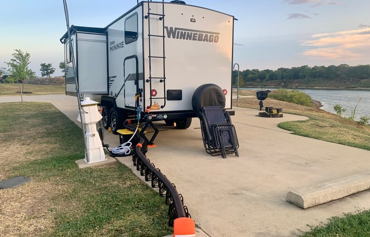 Watch a movie using a projector and the back of the Minnie as the big screen(Below the name and above the tire).