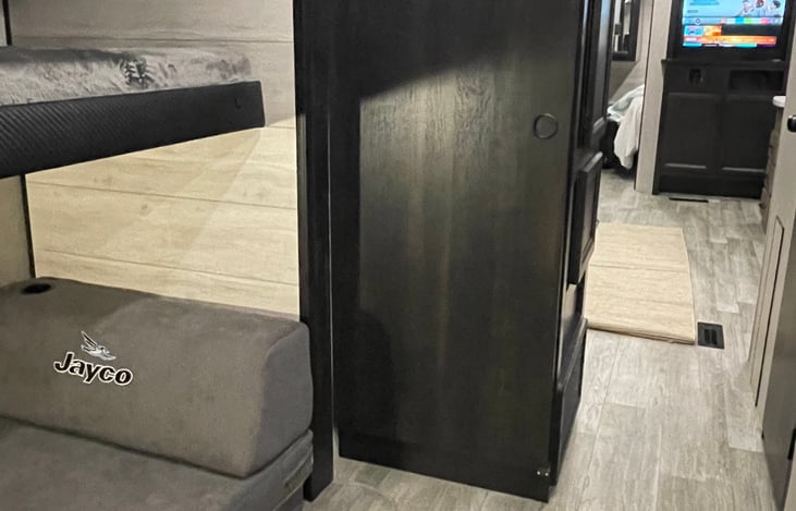 Bunk room has a door that can be closed off to the living area if you want