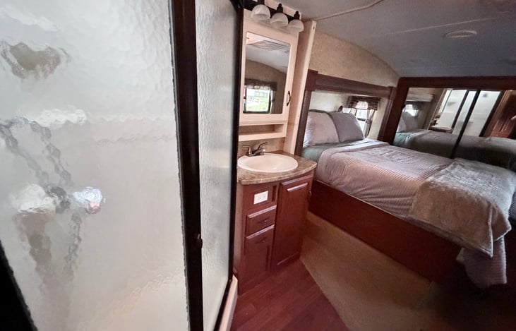 Full size shower and private bathroom