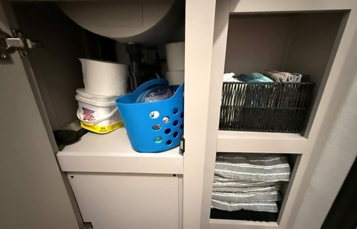 Under sink storage and cabinets. RV toilet paper, Towels, rags, ect..