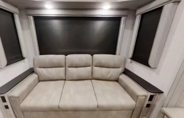 Large comfy couch that pulls out into 2nd bed area, which can sleep 2 adults.