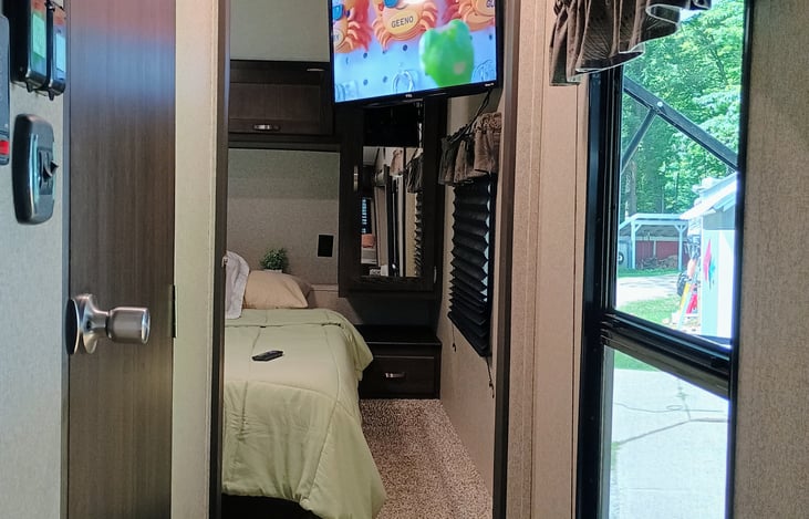 Bedroom has Smart TV.