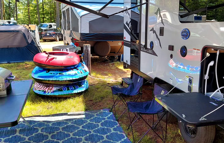 Outdoor carpet, folding table, external propane grill