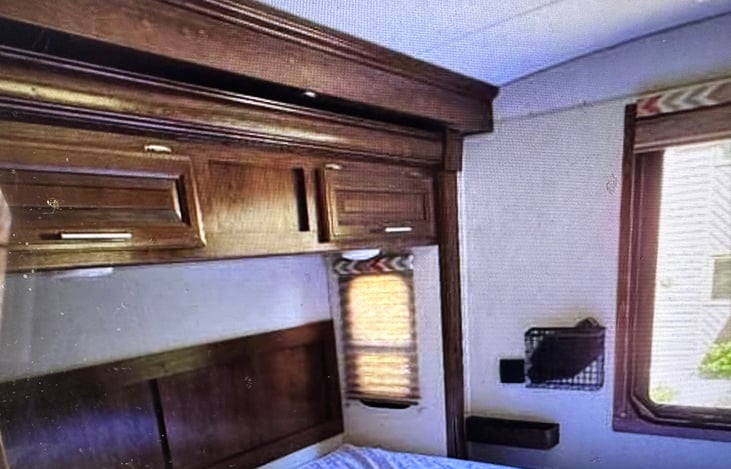 overhead storage compartments in Master Bedroom