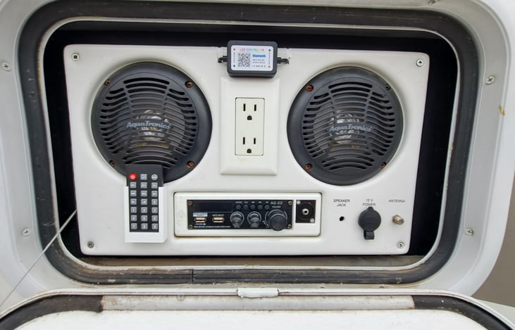 Outdoor speakers with bluetooth head unit.  Also plays AM/FM and Aux Jack