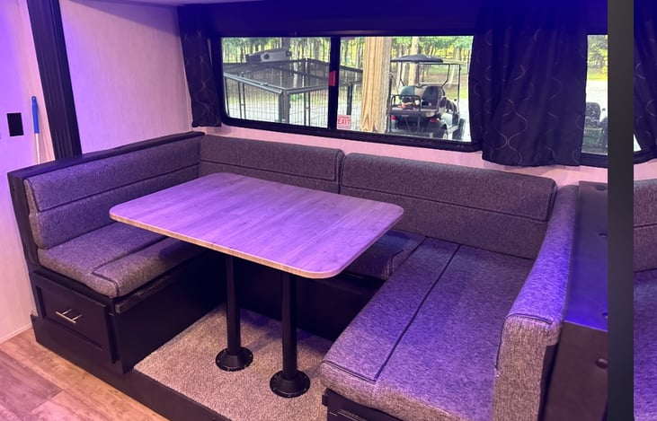 U-shaped dinette. Good for a small child to sleep