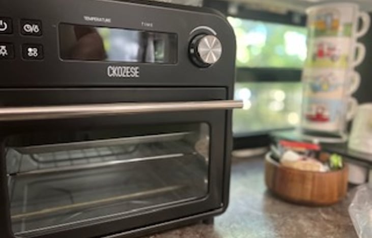 Air fryer oven. An Instant pot and induction cooktop with cookware is also provided.