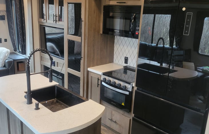 island kitchen with large spacious refrigerator