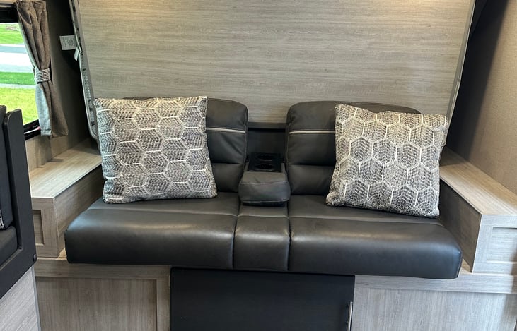 The couch is also a Murphy bed. which is another queen bed.
The couch slides down and then the Murphy bed can be brought down for sleeping.