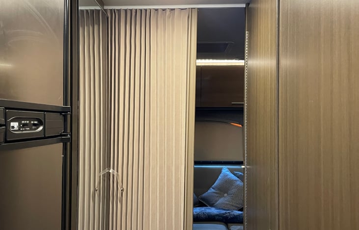 Sliding bedroom door for privacy.