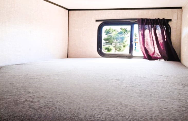 Breathe in the outdoors from your bunk — Enjoy Your Trailer and let every night feel like a scenic escape in this travel trailer.