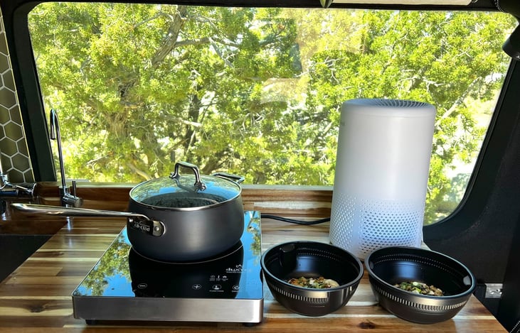 Cooking stove and pans are included.