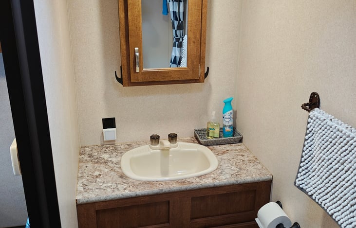 Huge sink and vanity for a camper this or any size.
