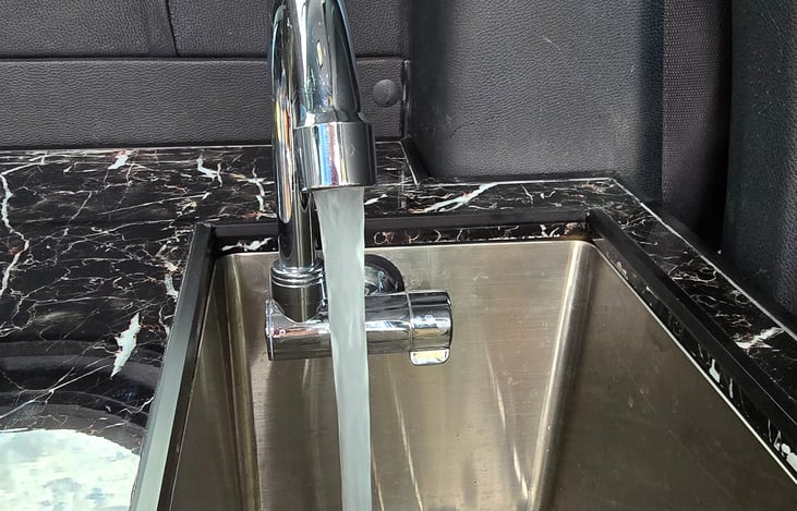 sink with potable water and holding tank