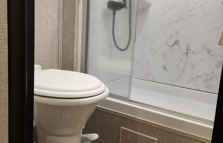 Porcelain toilet with foot flush