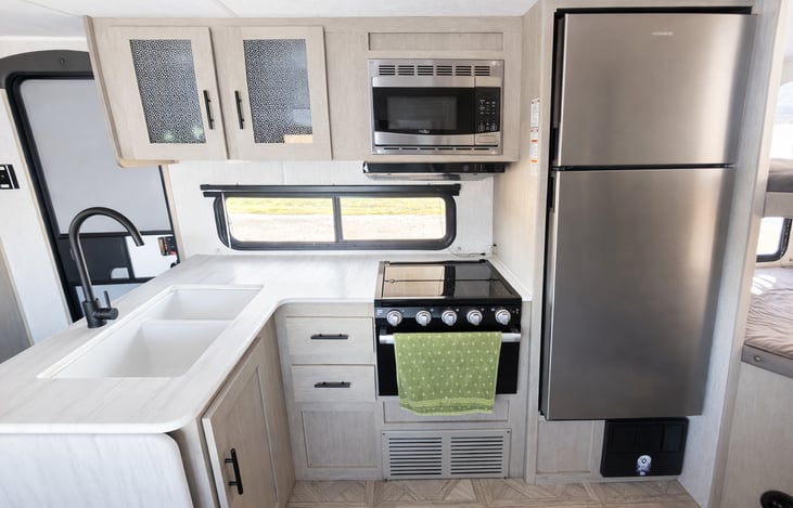 The kitchen will come fully stocked with everything you need to prepare a great meal. Just bring the food!

Plates
Cups
Bowls
Pots & Pans
Silverware
Coffee maker
Toaster
Serving utensils
Can opener