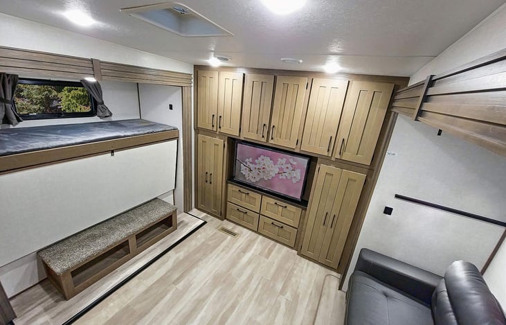 Bunk room with entertainment center, 3 bunks and sofa sleeper!