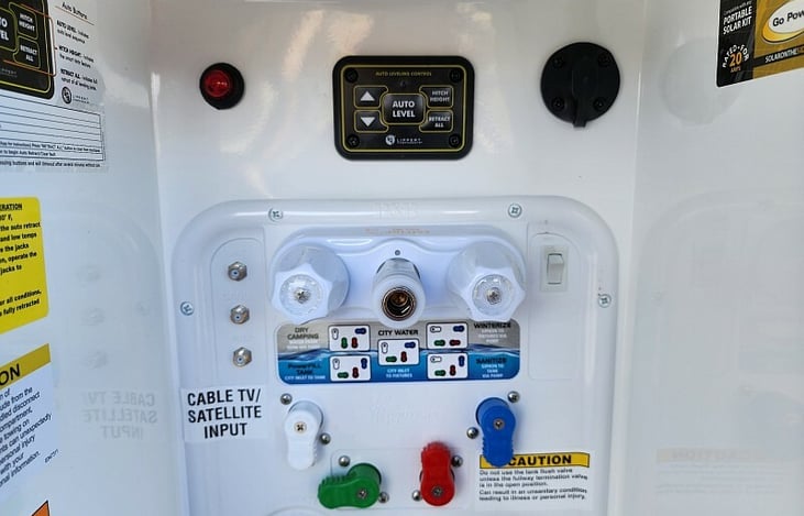 Easy control valve panel located in the front compartment and includes whole rv water filter.