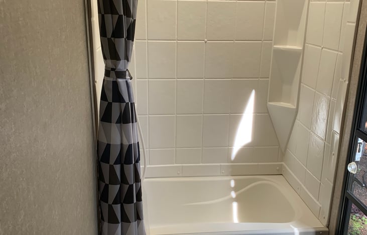 Stand up show with curtain in bathroom