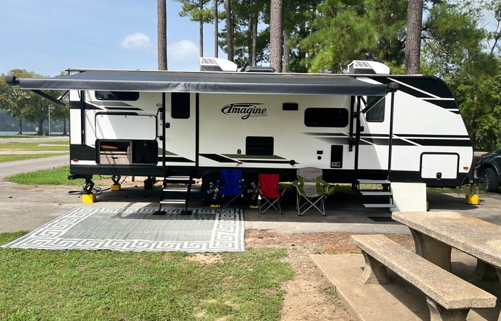 Our large awning and outdoor speakers can set the stage for a relaxing afternoon. Add our ultimate campsite package to enjoy all the amenities.