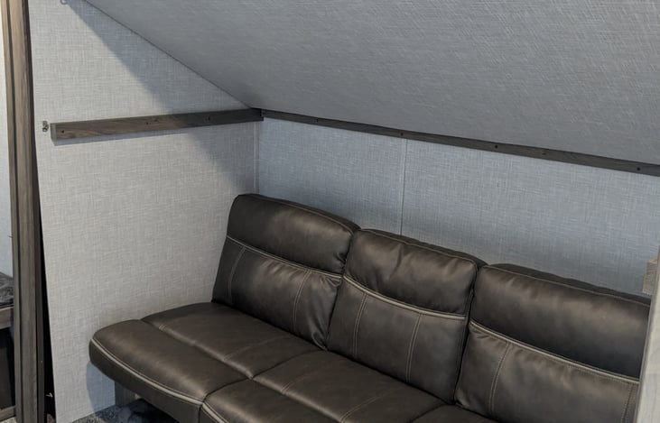 Bunk folds up for more living space, jack knife sofa folds into a bed.