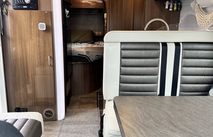 Lots of interior storage in this small but mighty unit. There is a pantry and a full closet with hangers and two drawers in addition to all the storage above the bed. A radio/dvd/cd player is included