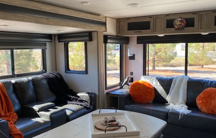 Relaxation corner.  Single fixed windows and dual sliding windows with screens.