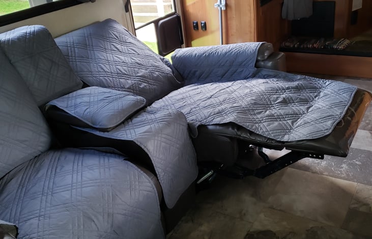 Just like at home, fall asleep in the recliners while watching TV.