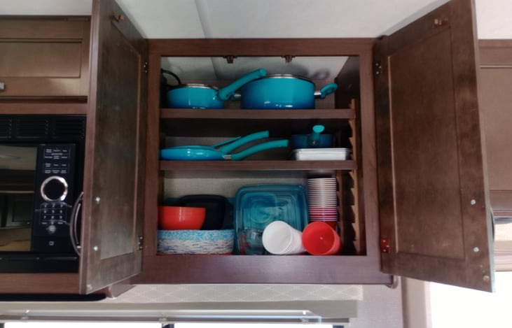 Pots and pans storage bowls cups plates ect. I can have this space clear if you wish to  bring your own.