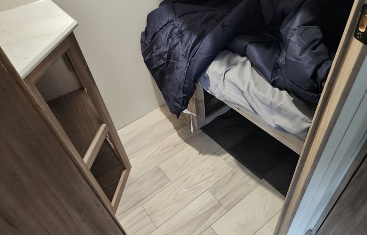 Storage under the bed and small storage in the bunkhouse