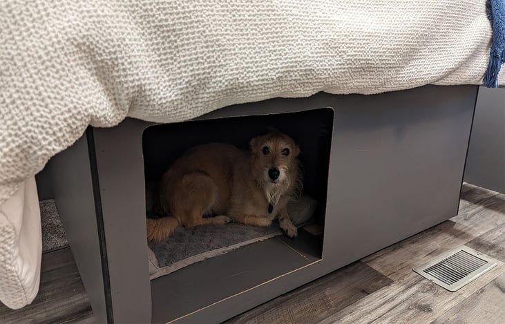 Our built in doggie den under the queen bed. Our fur baby Eddie loves it!
