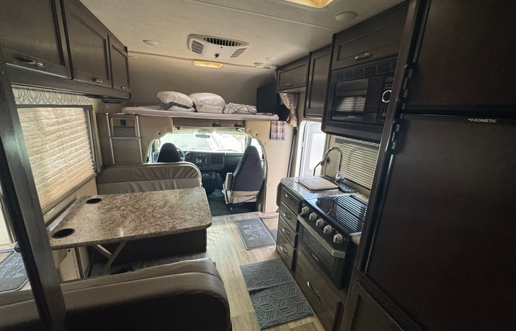 Upper bunk with added padding for extra comfort. bedding can be added as an add on. can sleep two adults comfortably.