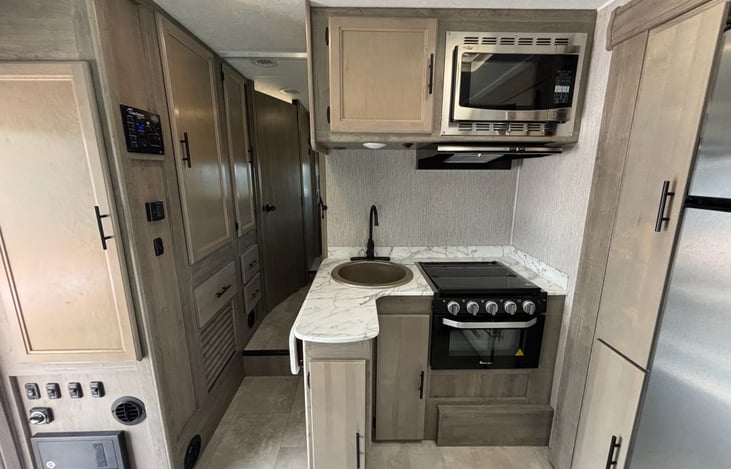 Pantry to the left
Sink, Stove, Oven, Microwave