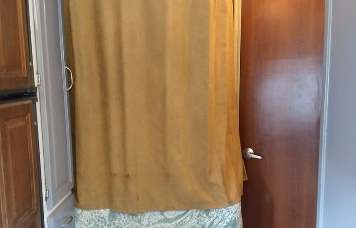 Privacy curtain around main bed