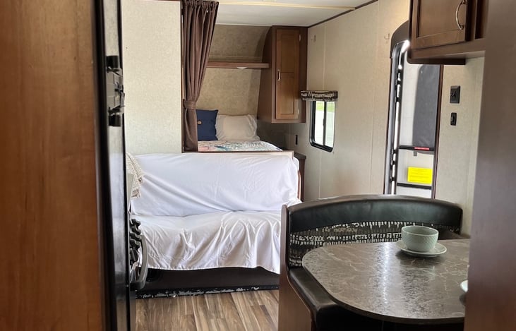 Easy flow, Since this RV does not have a slide-out the sofa faces the TV mounted in the kitchen.