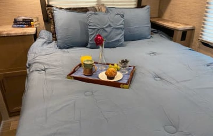 Queen-size bed in the back bedroom.