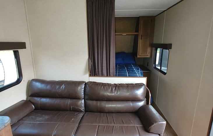 Sofa Sleeper and Master Bed, includes curtain for Privacy