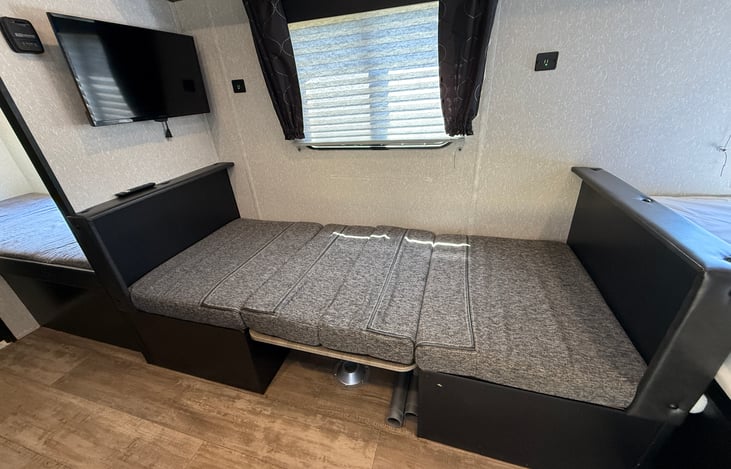 Dinette folds into a twin sized bed