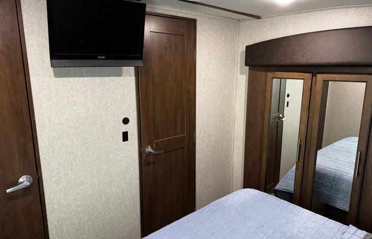 Master bedroom with queen bed.