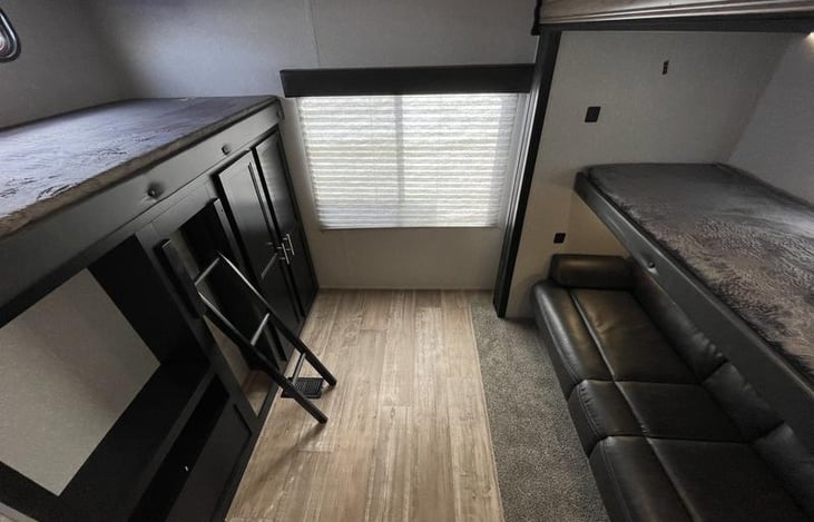 The separate bunk room provides privacy and additional sleeping for up to 4 people