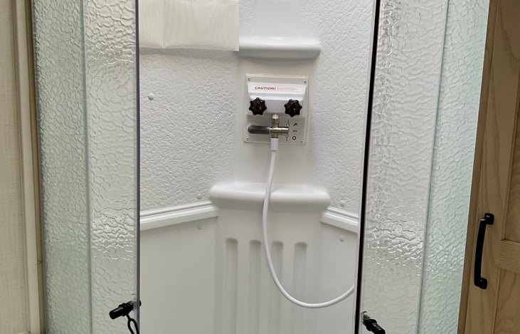 wet shower, separate from toilet.