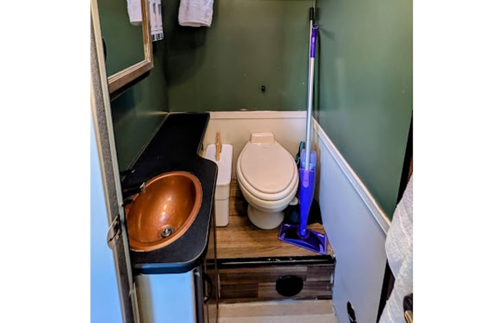 Toilet & sink
Trash can, toilet brush, swiffer mop and broom provided