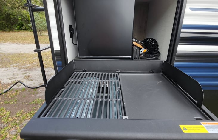 Outside refrigerator and grill