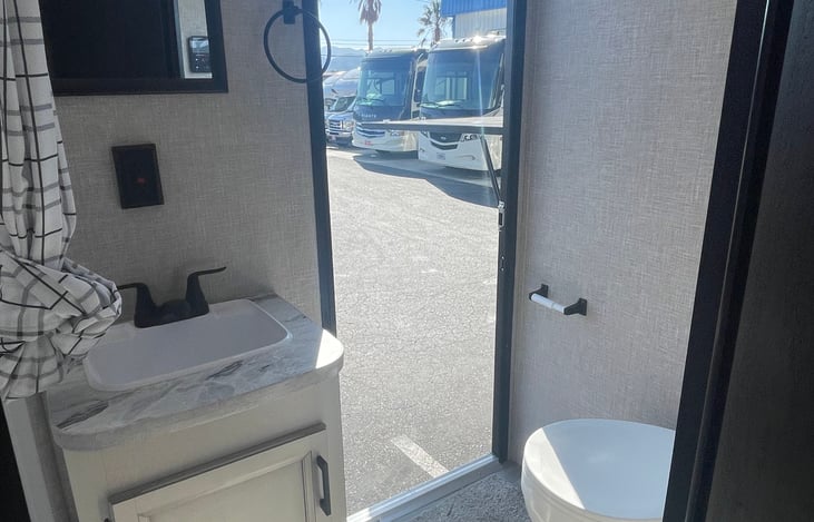 Bathroom with door to the outside