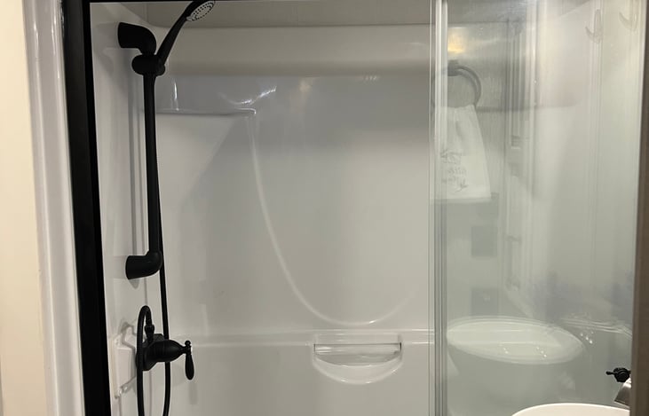 Shower is big with loads of headroom and skylight