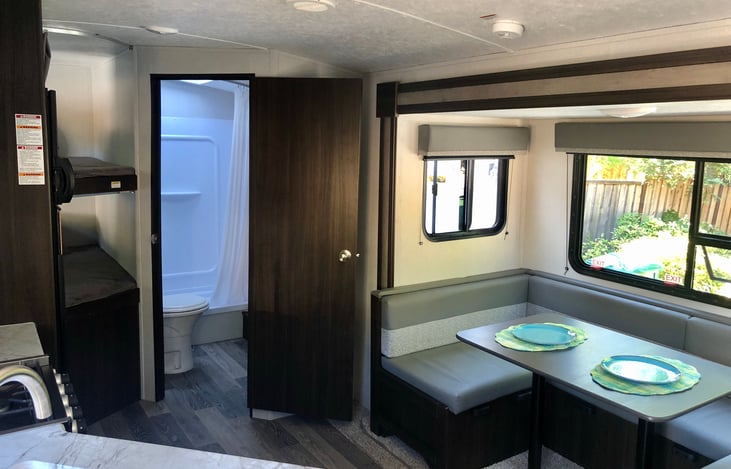 Slideout that becomes a dining area and can also flip into a bed!